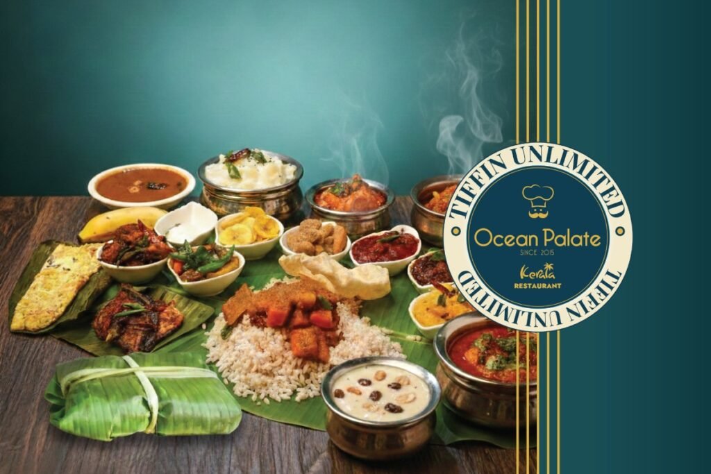 Kerala Seafood Sadhya (Samudhra Sadhya) served on banana leaf with matta rice, fish curry, prawn roast, meen fry, avial, thoran, pickles, papadam and payasam at Ocean Palate – Authentic Kerala seafood restaurant in Ontario, Canada offering traditional South Indian feast and Tiffin Unlimited meal service in Mississauga and Brampton.