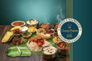 Kerala Seafood Sadhya (Samudhra Sadhya) served on banana leaf with matta rice, fish curry, prawn roast, meen fry, avial, thoran, pickles, papadam and payasam at Ocean Palate – Authentic Kerala seafood restaurant in Ontario, Canada offering traditional South Indian feast and Tiffin Unlimited meal service in Mississauga and Brampton.